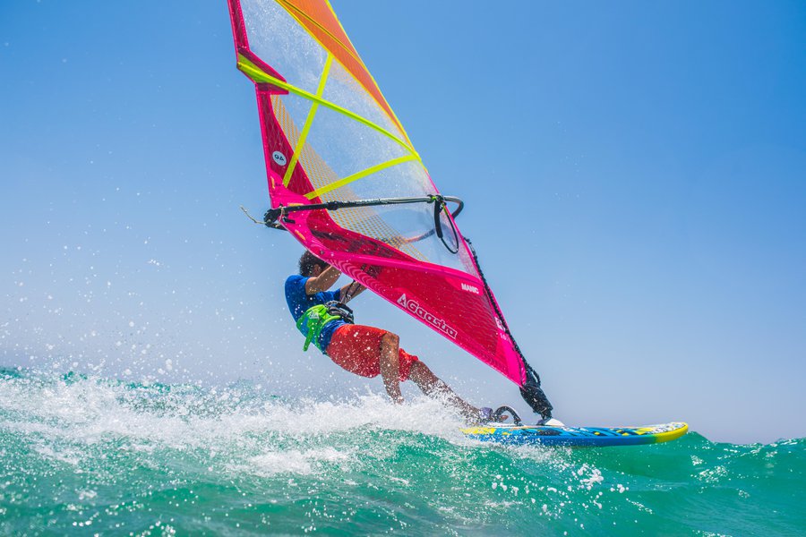 To go windsurfing in Spanish English to Spanish Translation
