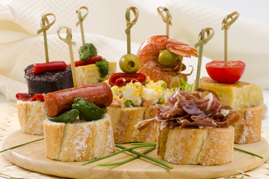 Tapa | Spanish to English Translation - SpanishDictionary.com